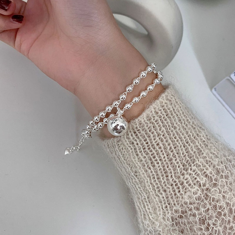 Bracelet with ball pendant