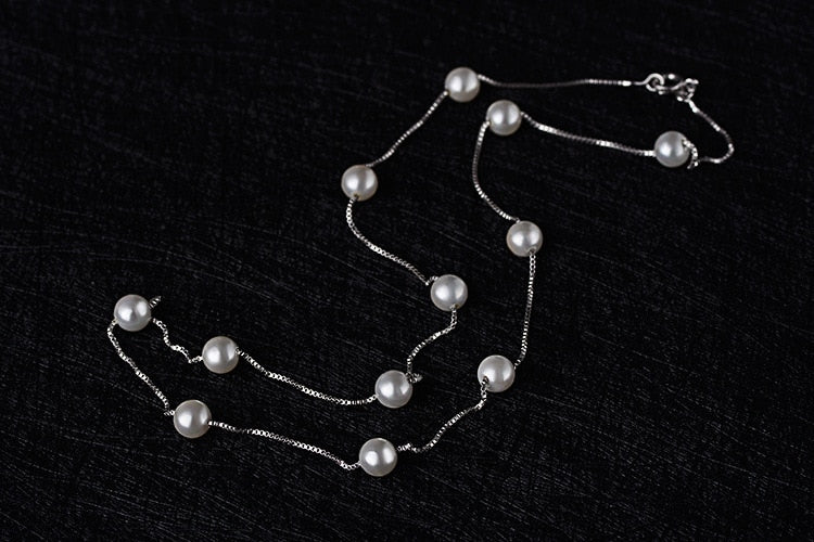 Necklace with imitation pearls