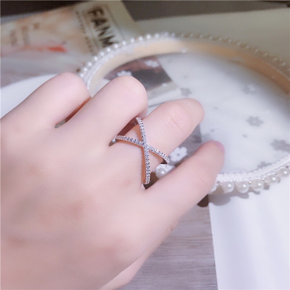 Double ring with zircons