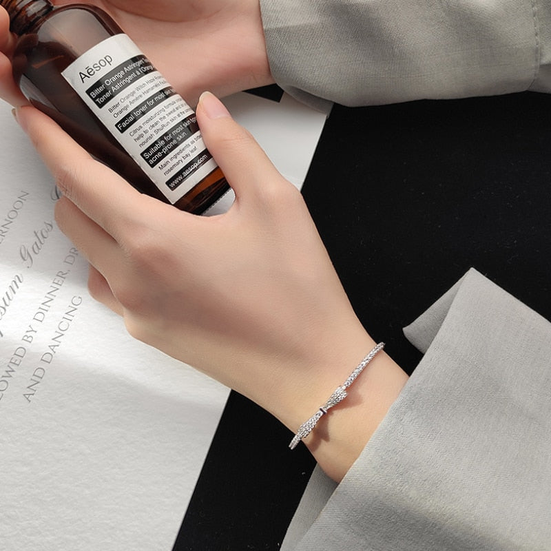 Silver bracelet with a bow