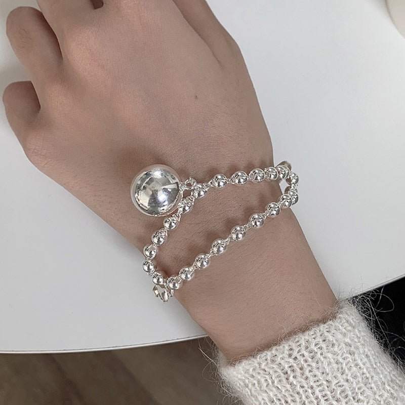 Bracelet with ball pendant