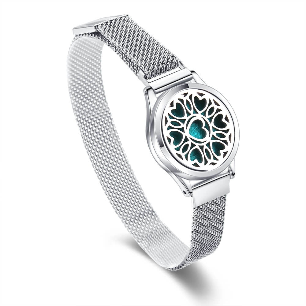 A wide bracelet with a heart motif