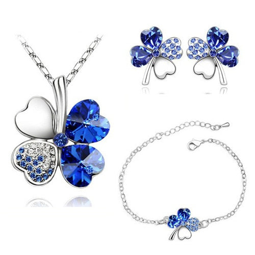 A set of jewelry with a four-leaf clover
