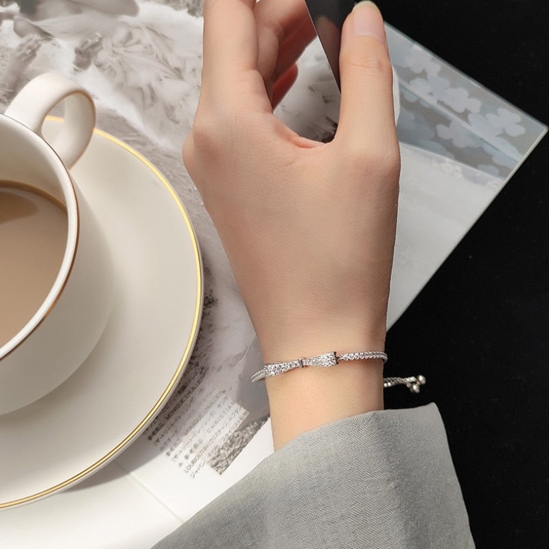 Silver bracelet with a bow