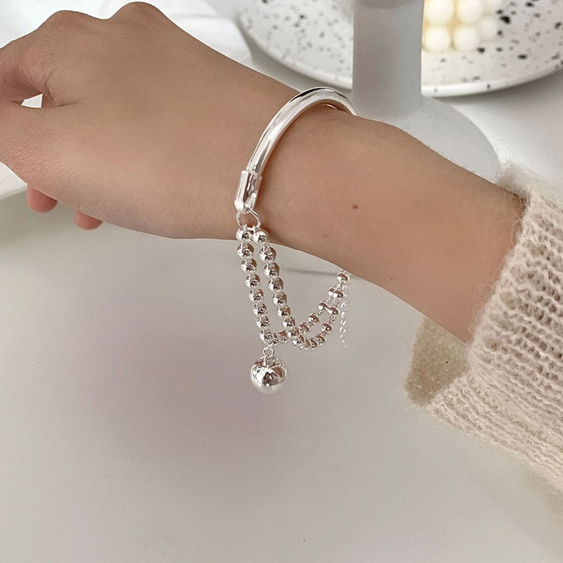 Bracelet with ball pendant