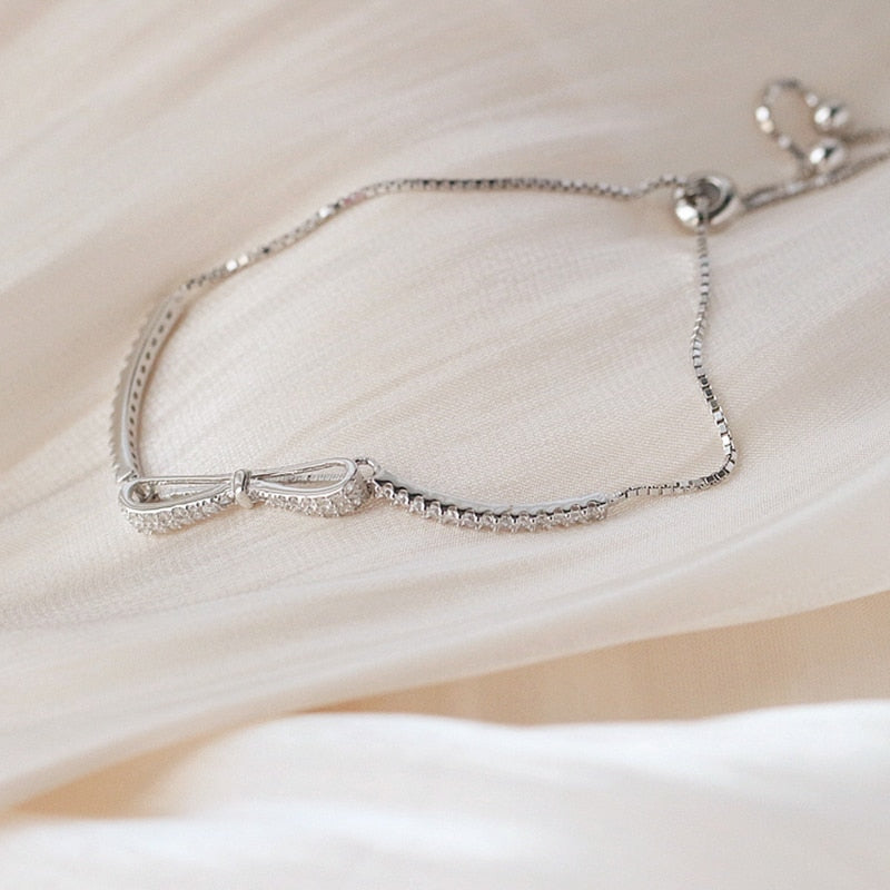 Silver bracelet with a bow