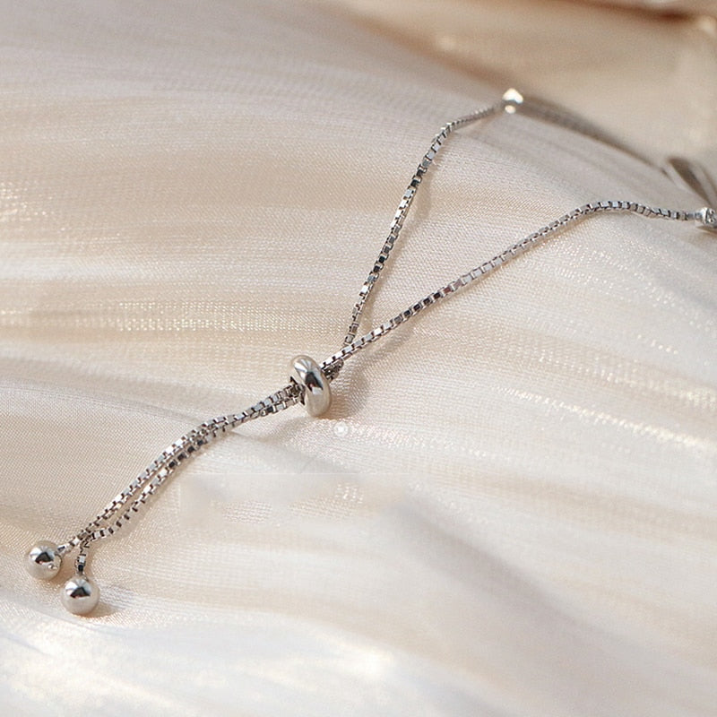 Silver bracelet with a bow