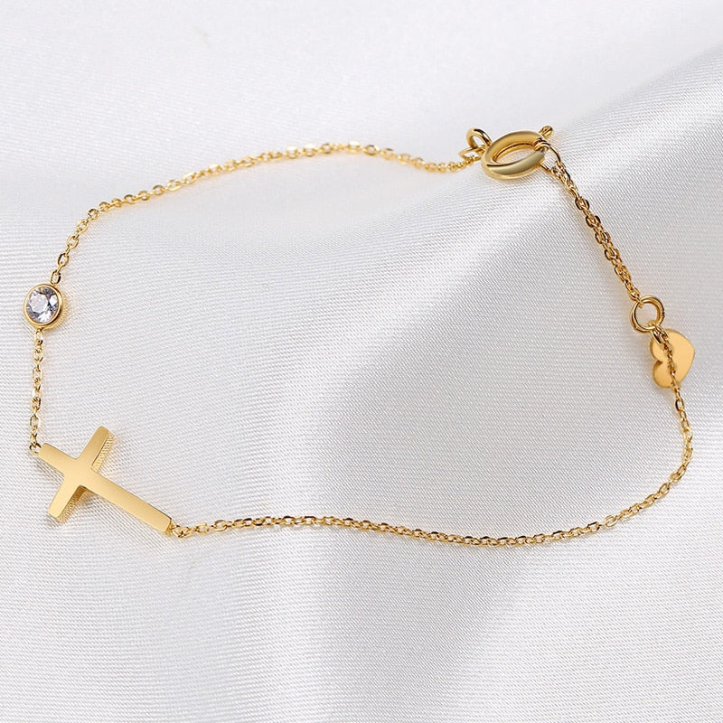 Bracelet with cubic zirconia and a cross