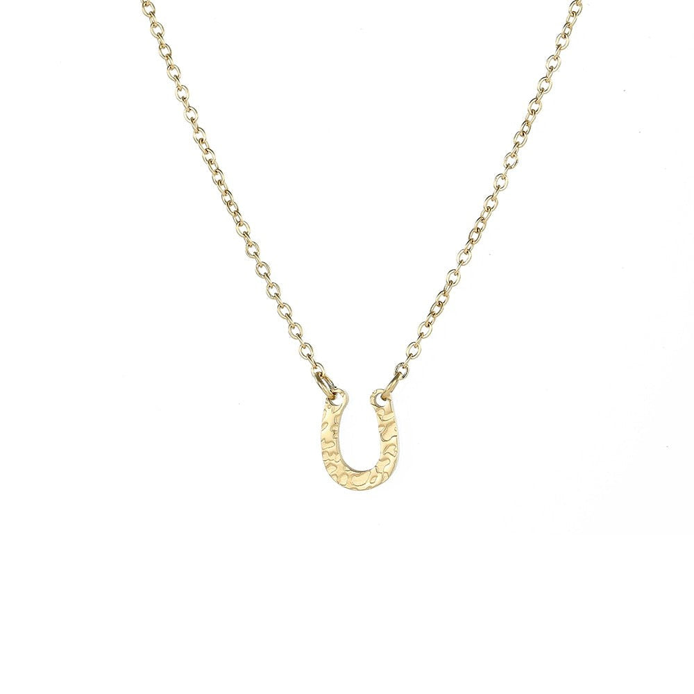 Necklace with a pendant in the shape of a horseshoe