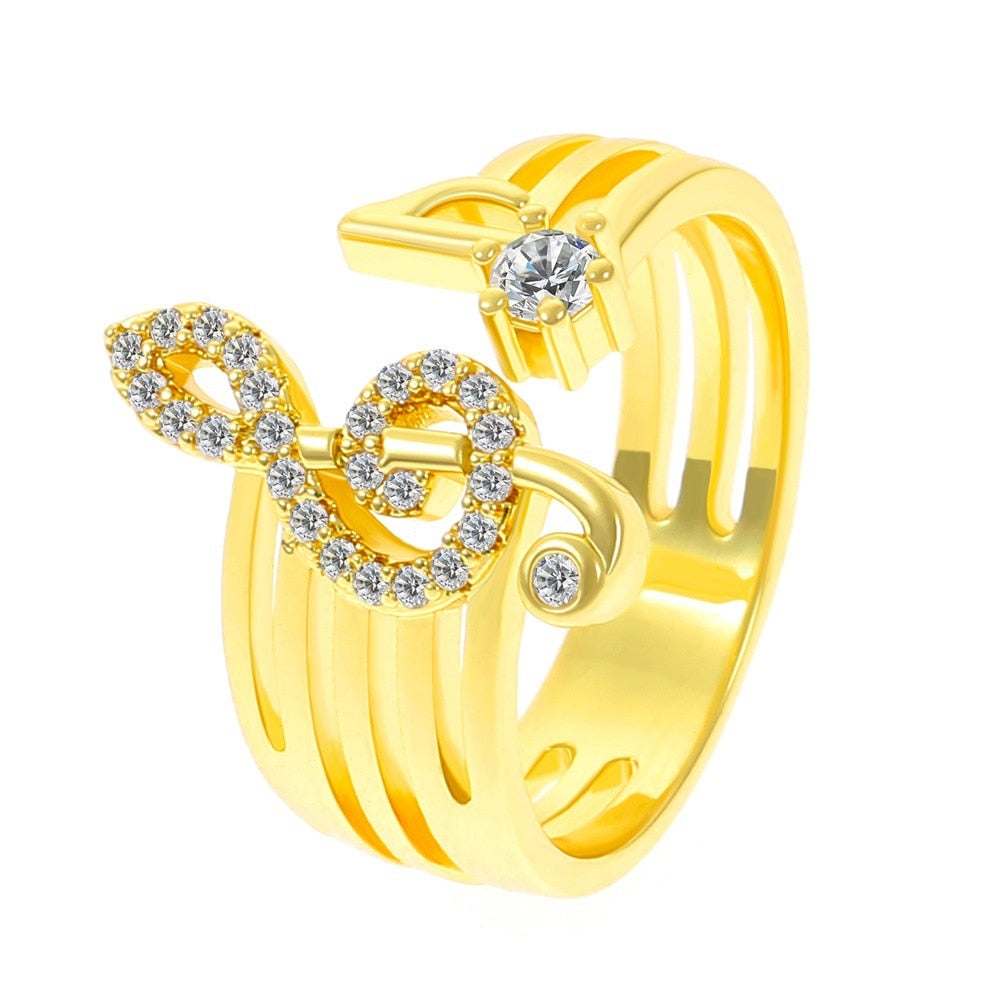 A shiny ring with a treble clef