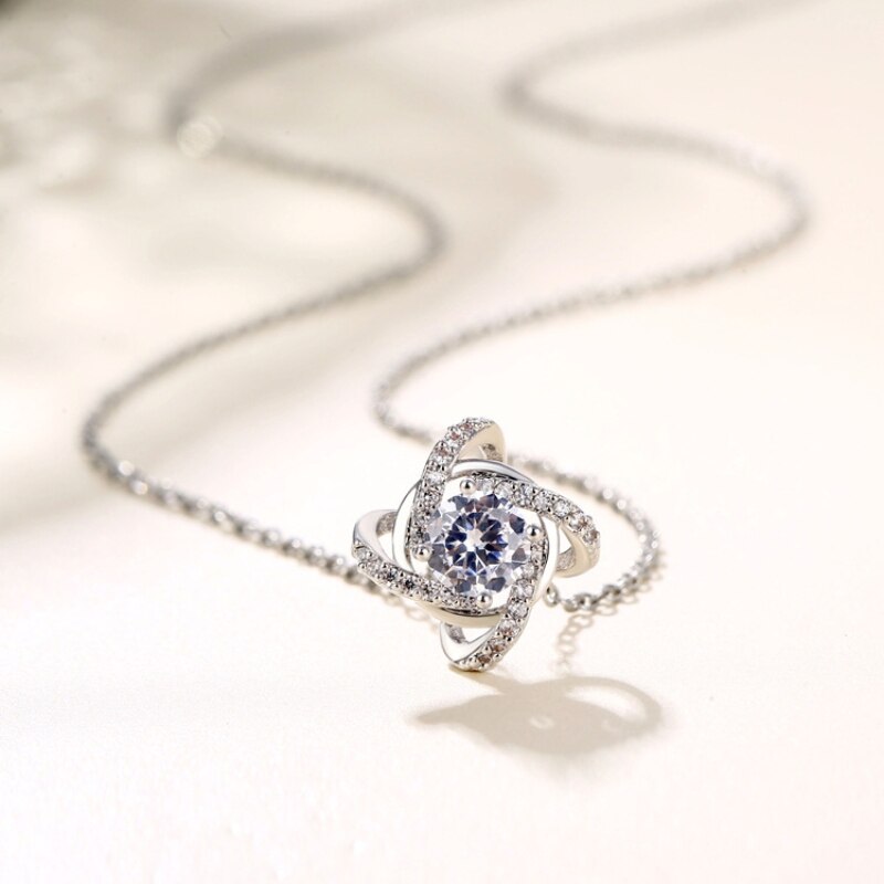 Necklace with a shiny pendant