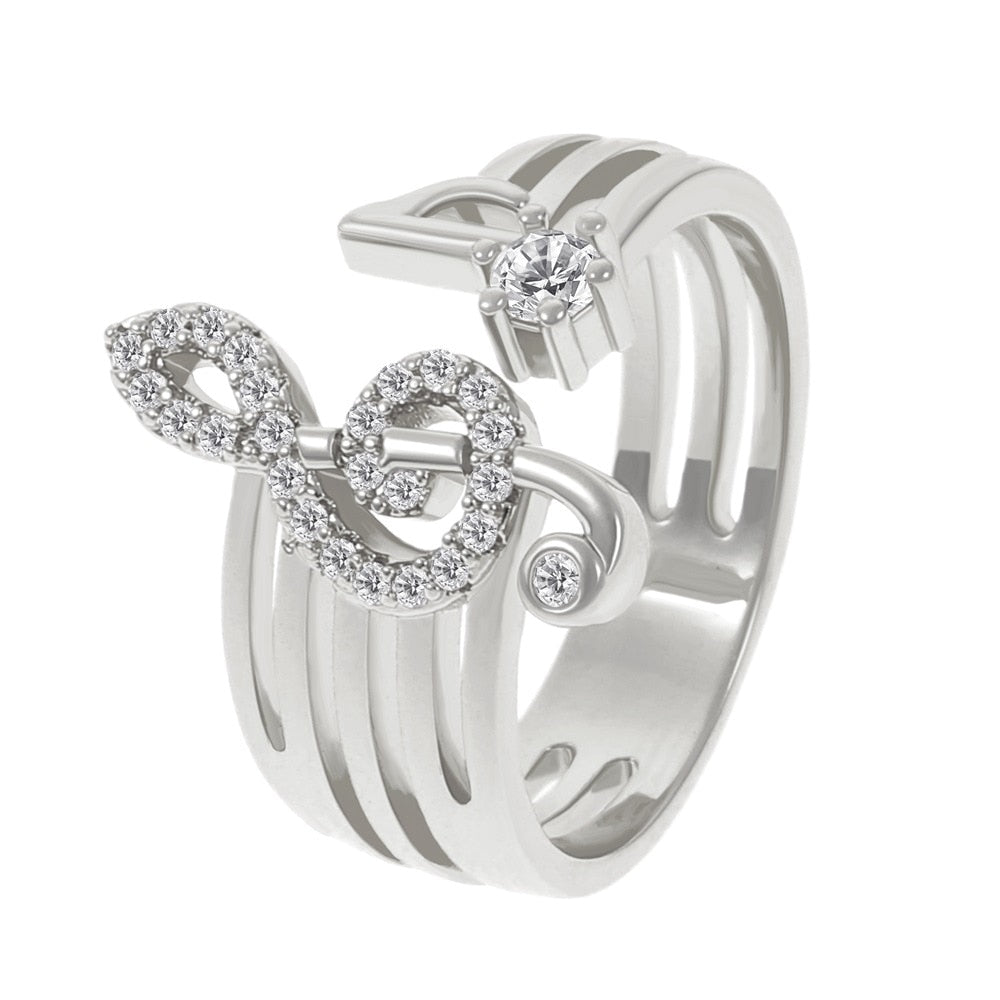 A shiny ring with a treble clef