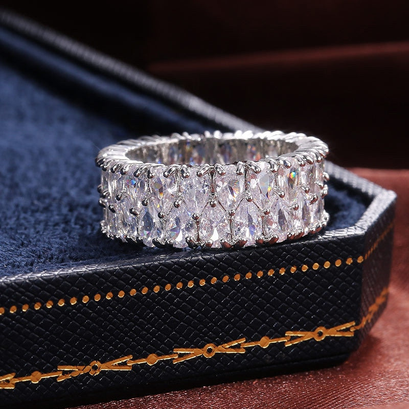 Silver ring with zircons