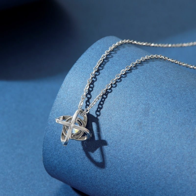 Necklace with a shiny pendant