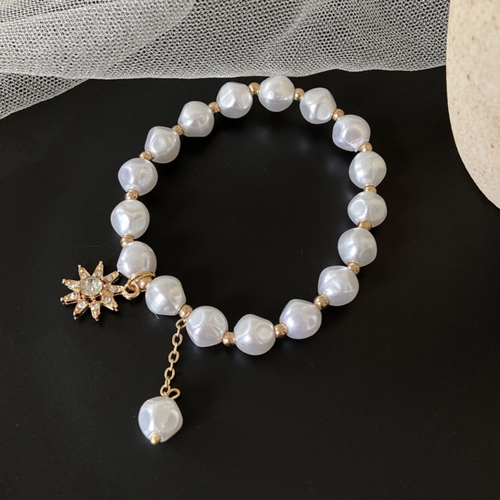 Beaded bracelet with decorative charms