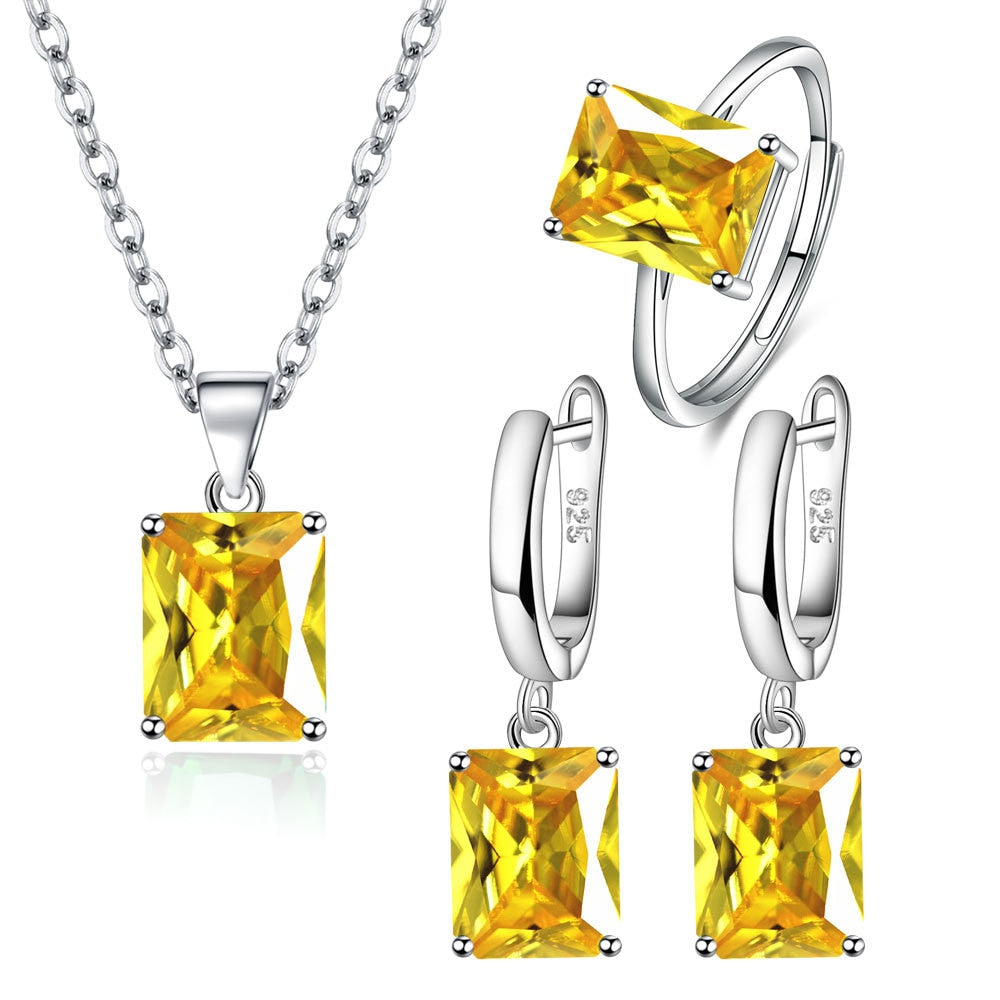 Silver jewelry set with colorful zircons