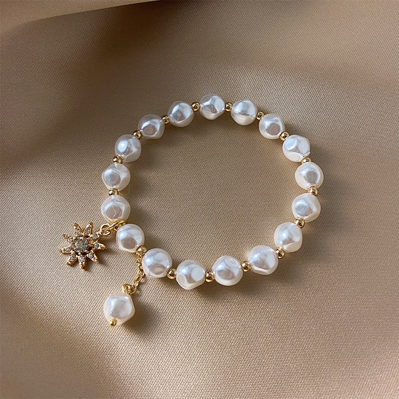Beaded bracelet with decorative charms