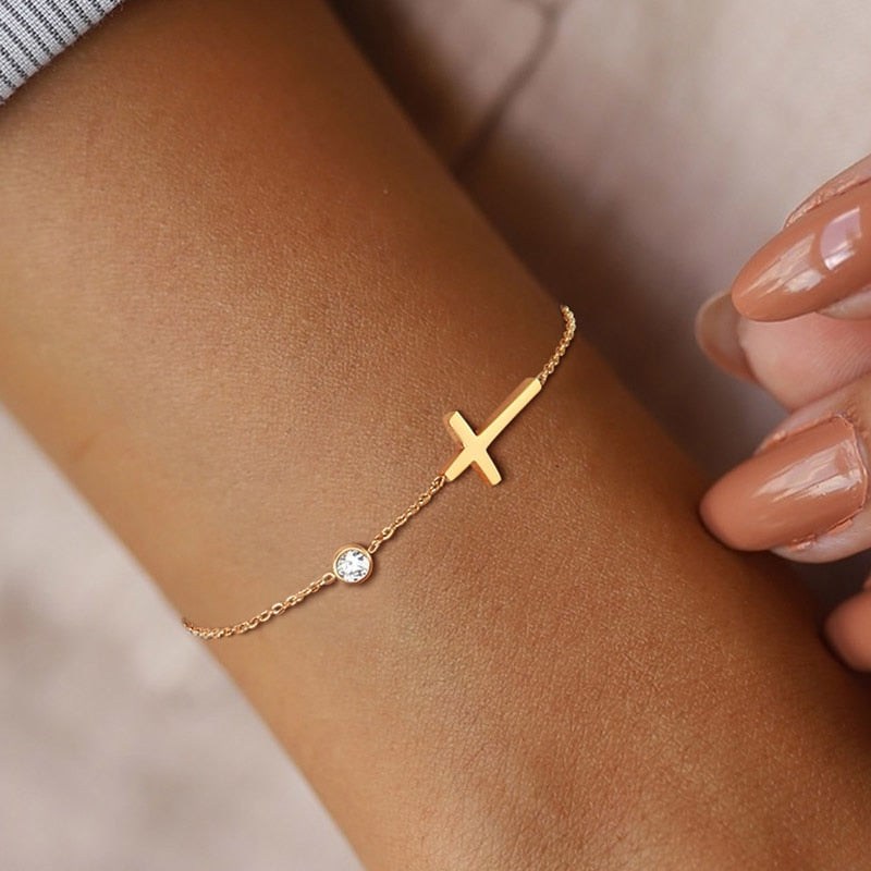 Bracelet with cubic zirconia and a cross