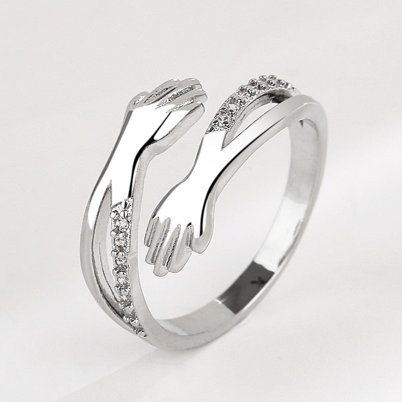 Ring with a hand motif