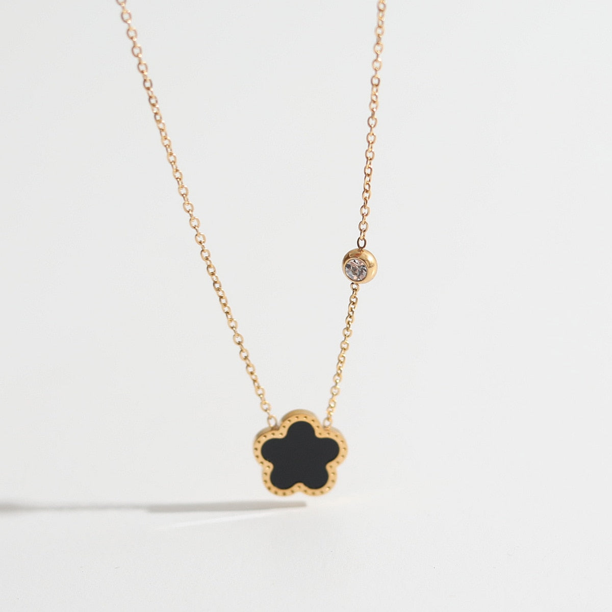 Necklace with colorful flower and zircon