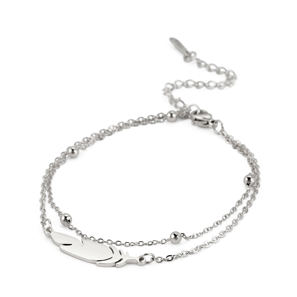 Ankle bracelet with a feather
