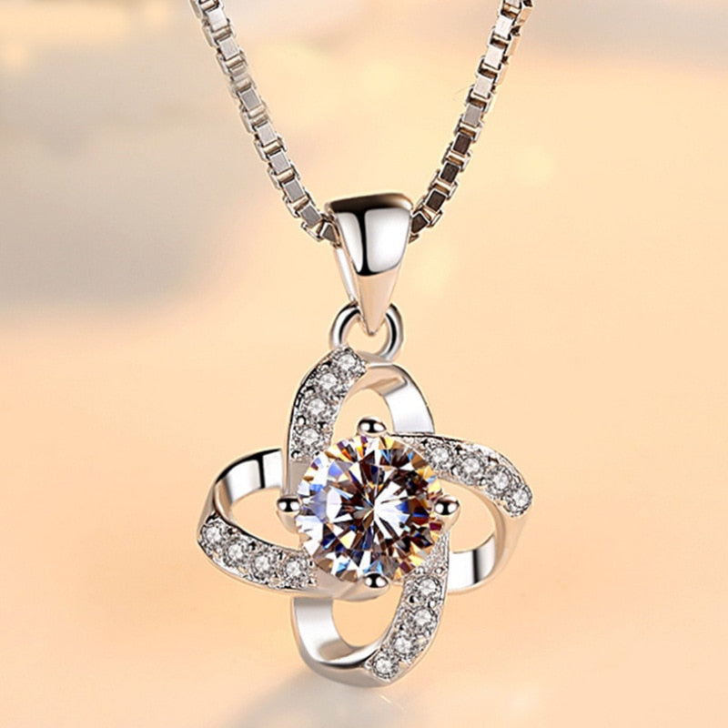 Necklace with a shiny pendant