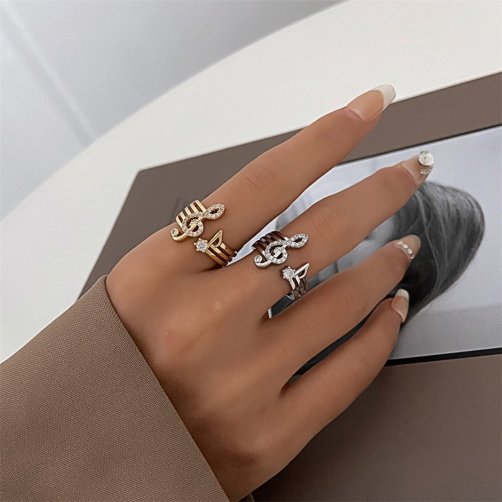 A shiny ring with a treble clef