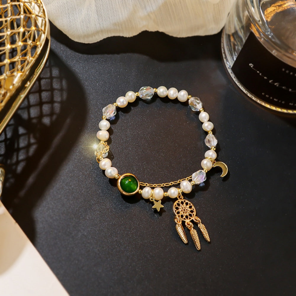 Bracelet with a pendant in the shape of a dream catcher