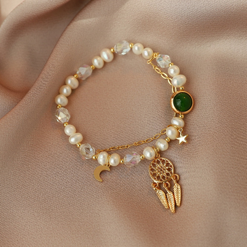 Bracelet with a pendant in the shape of a dream catcher