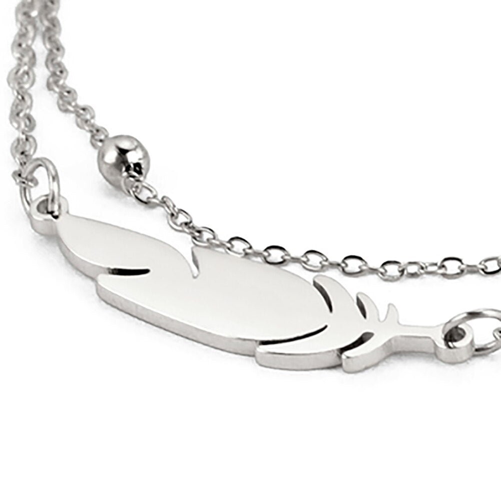 Ankle bracelet with a feather