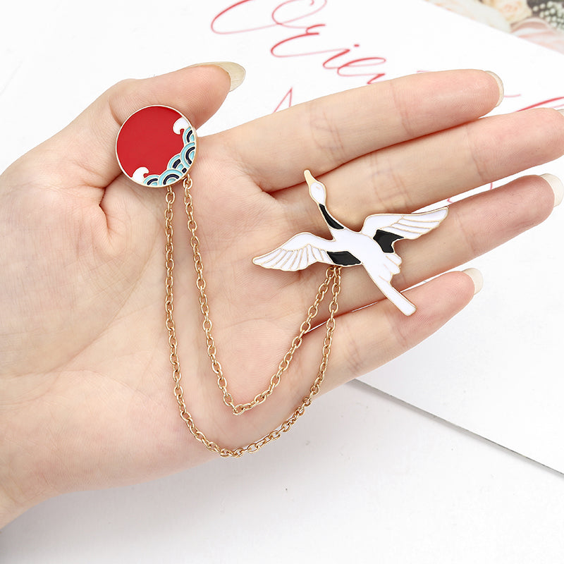 Pin with a chain - bird
