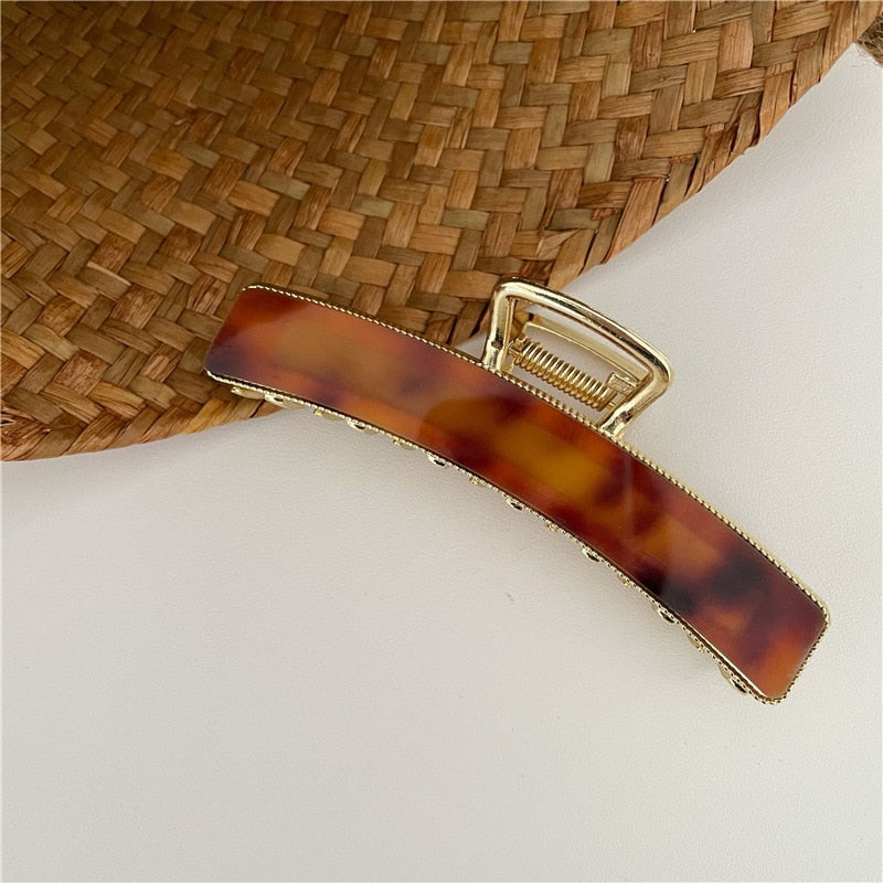 Acrylic hair clip with a marble pattern