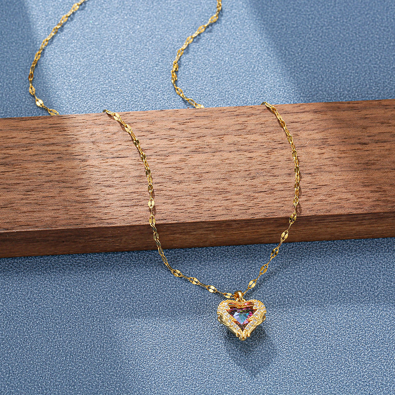 Necklace with a heart-shaped pendant with zircons