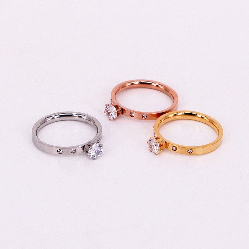 Ring with an eyelet and zircons