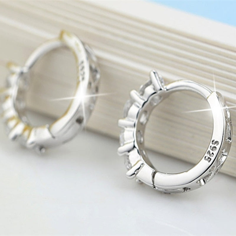 Silver earrings with zircons