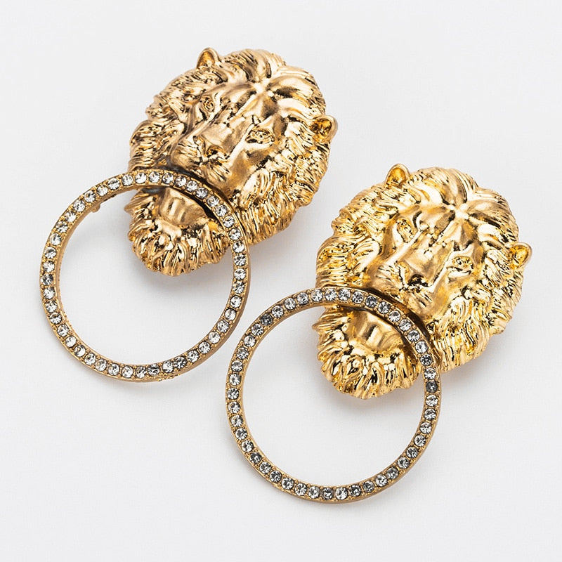 Earrings with a lion motif