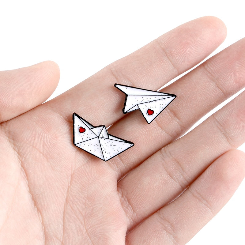 Pins - paper airplane and boat