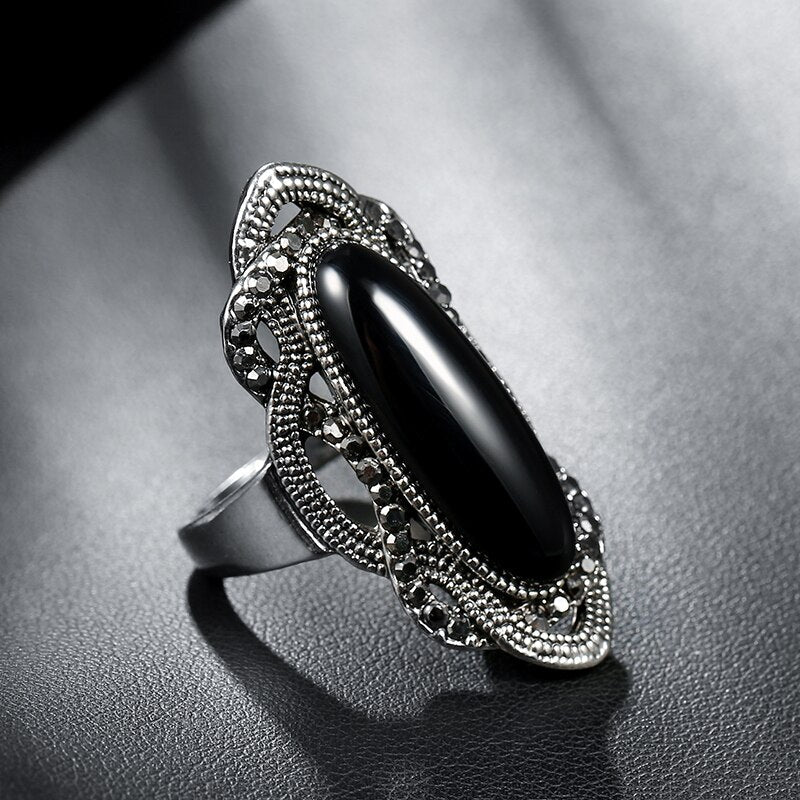 Ring with a longitudinal eyelet