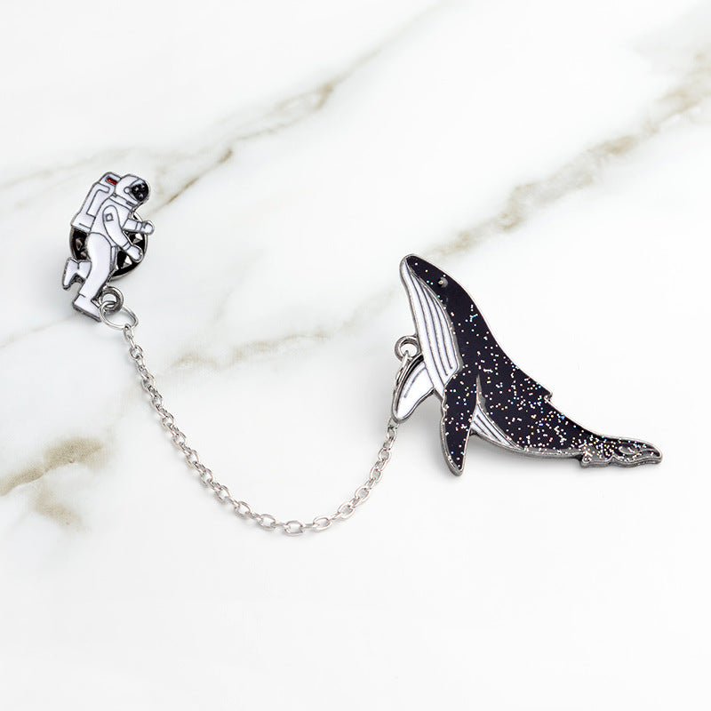 Pin with a chain - whale and astronaut