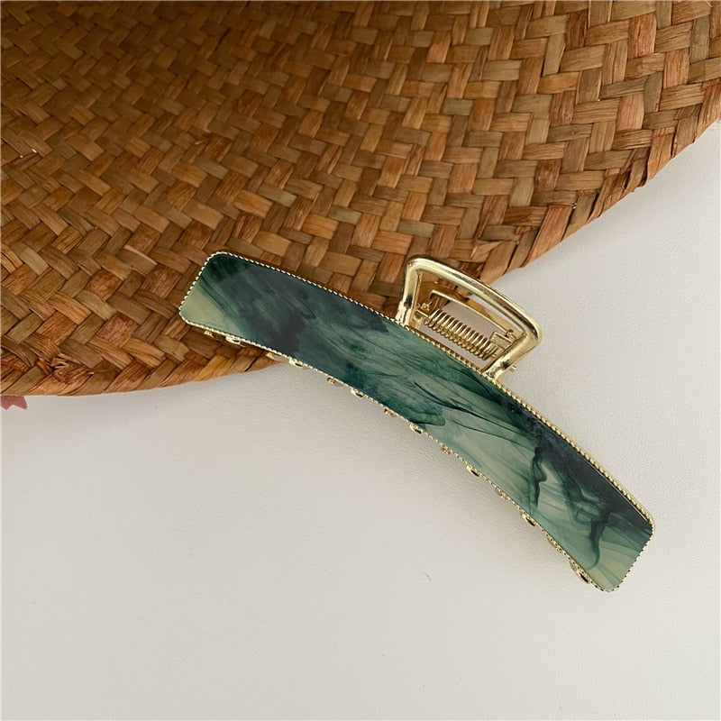 Acrylic hair clip with a marble pattern