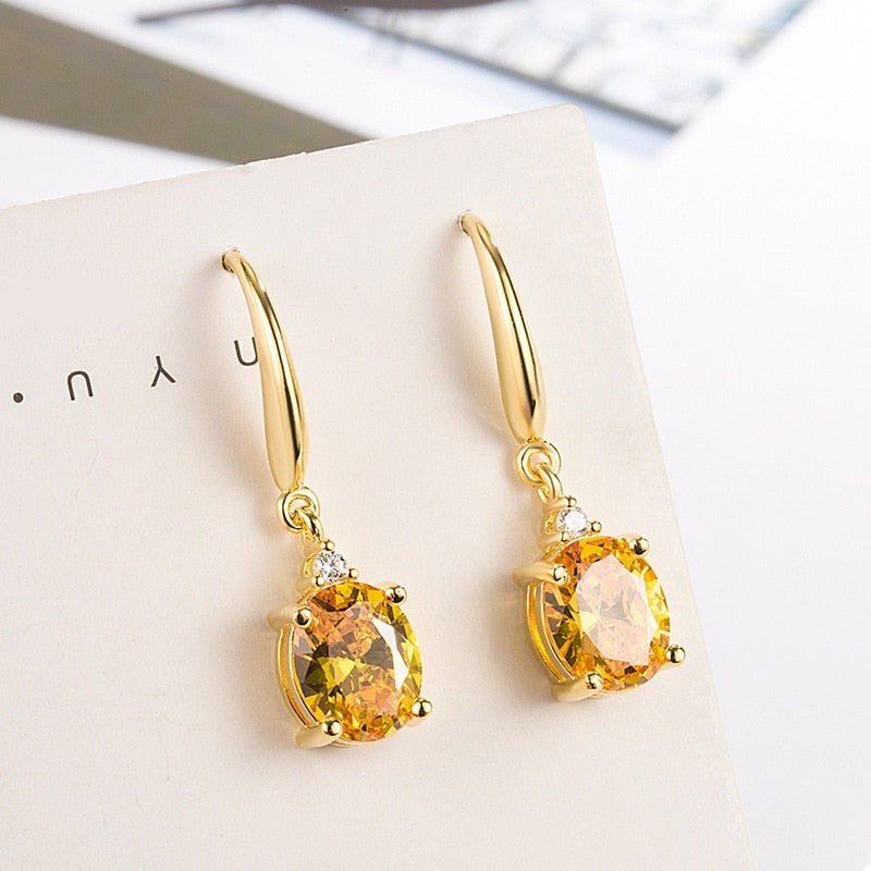 Gold earrings with zirconia