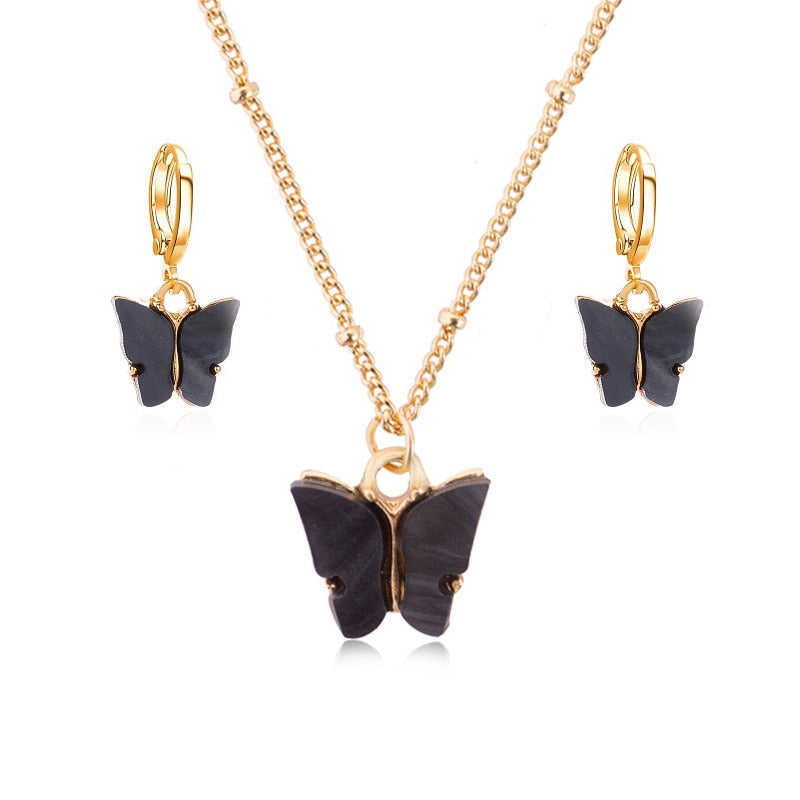 Set with a butterfly motif
