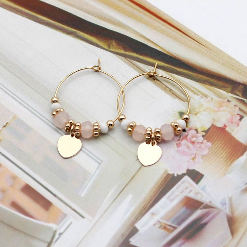 Hanging earrings with pendants