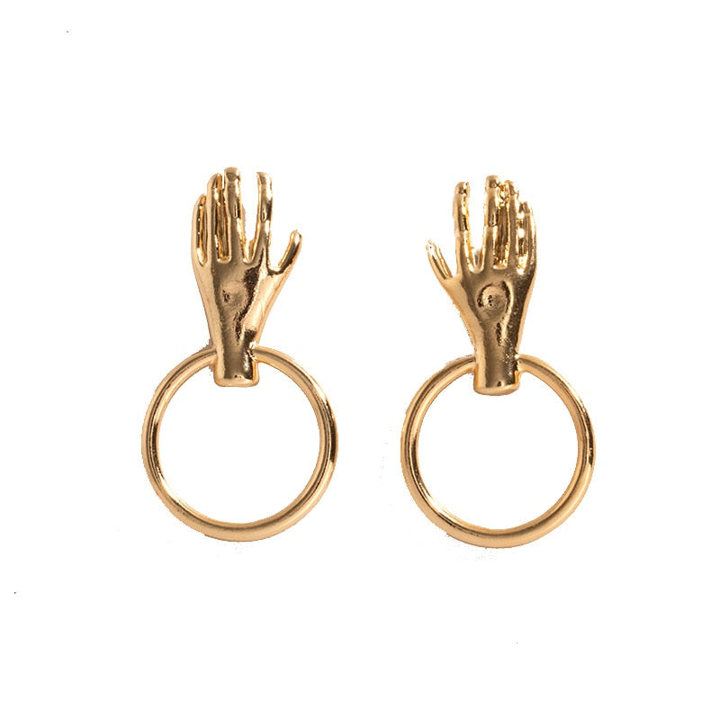 Earrings with a hand motif