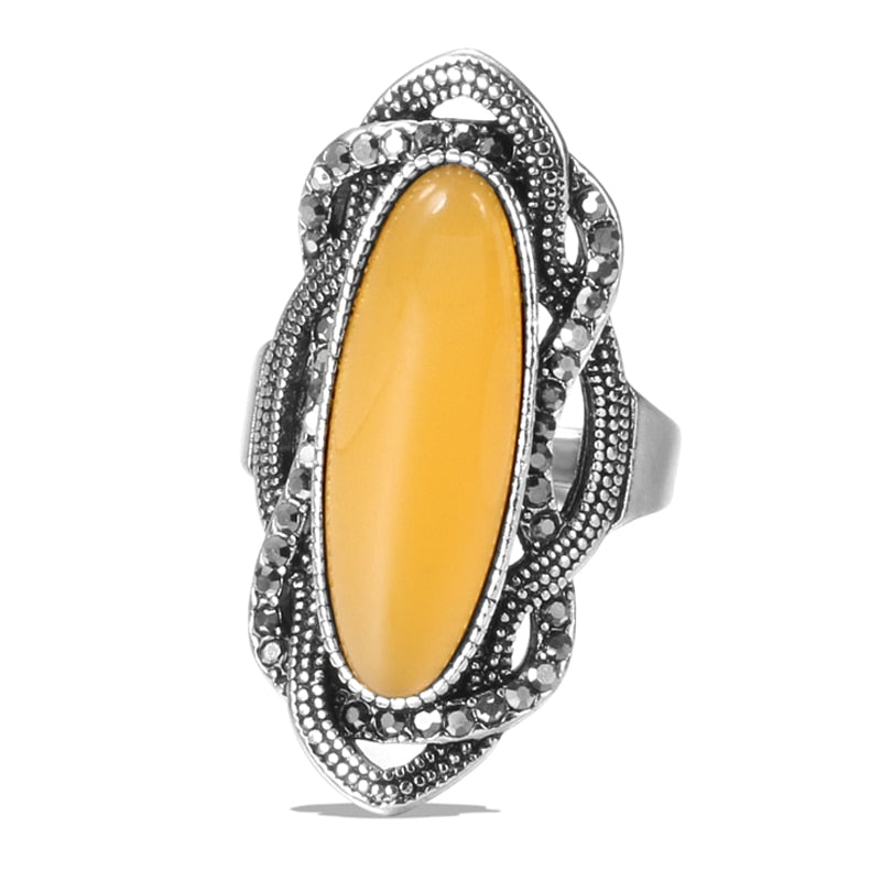 Ring with a longitudinal eyelet