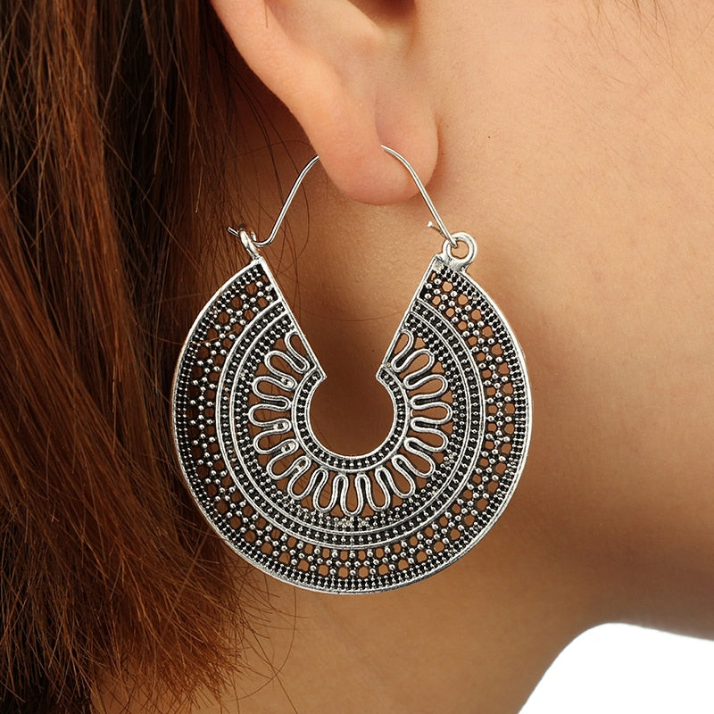 Earrings with Aztec motif