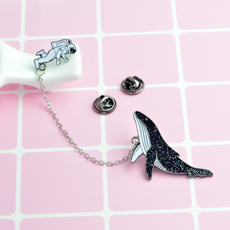 Pin with a chain - whale and astronaut