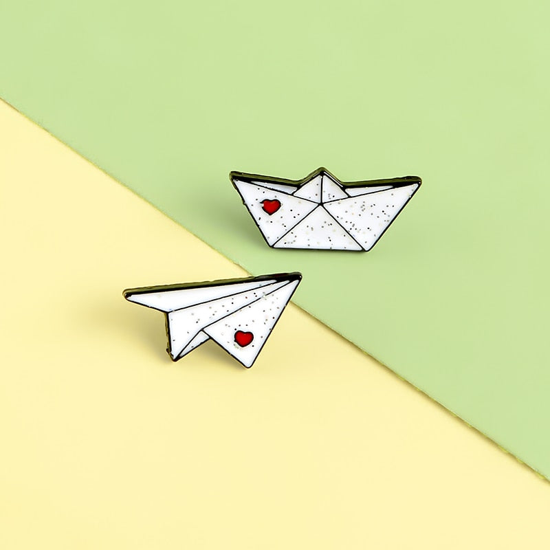 Pins - paper airplane and boat
