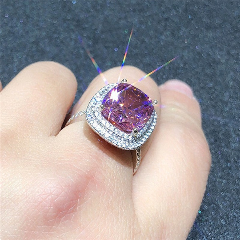 Ring with zircons and a stone