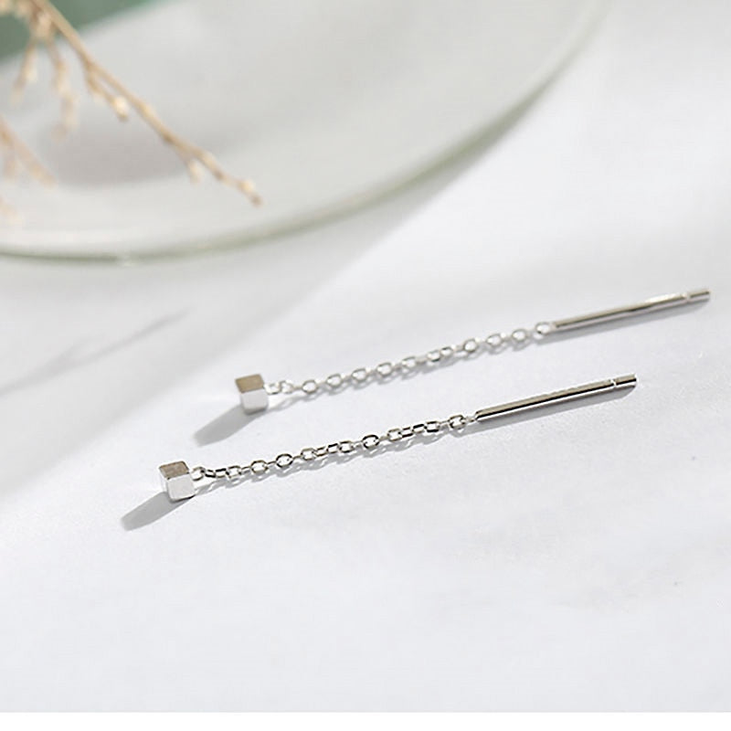 Threader earrings with a cube